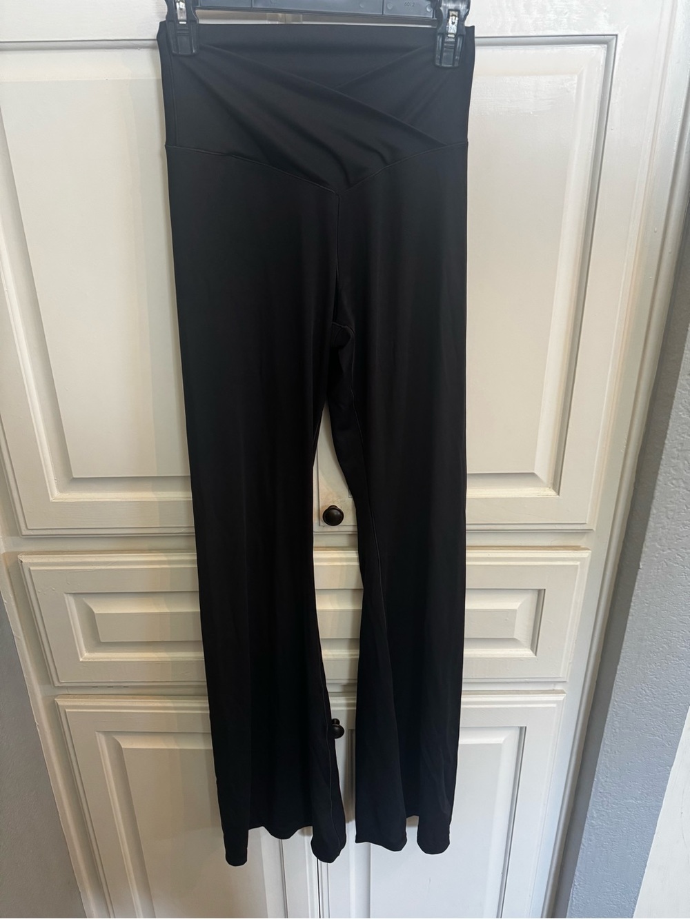 High-Waist Black Flare Leggings with Crossover Waistband